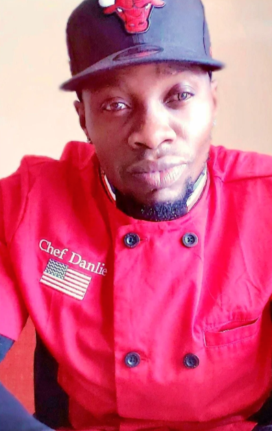 Chef Danlie standing confidently